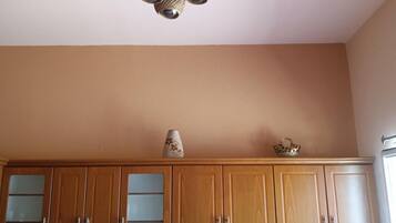 Fridge, stovetop, coffee/tea maker, electric kettle