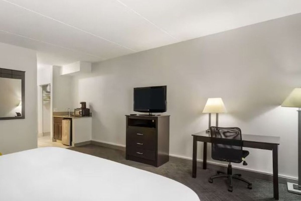 Stretch out with extra space, bright lighting, and a handy work area.