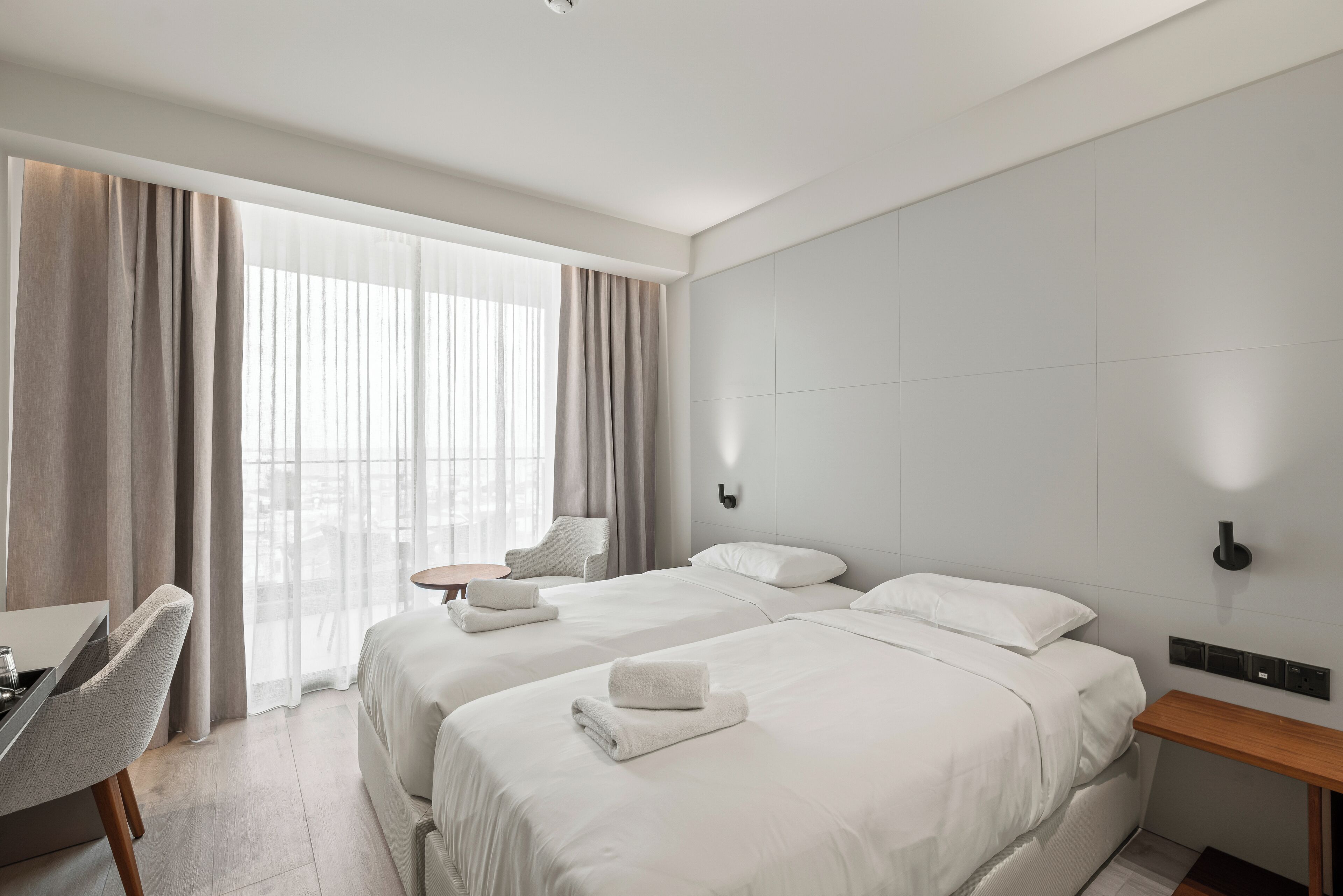 Classic Twin Room, Balcony, City View | In-room safe, desk, laptop workspace, iron/ironing board