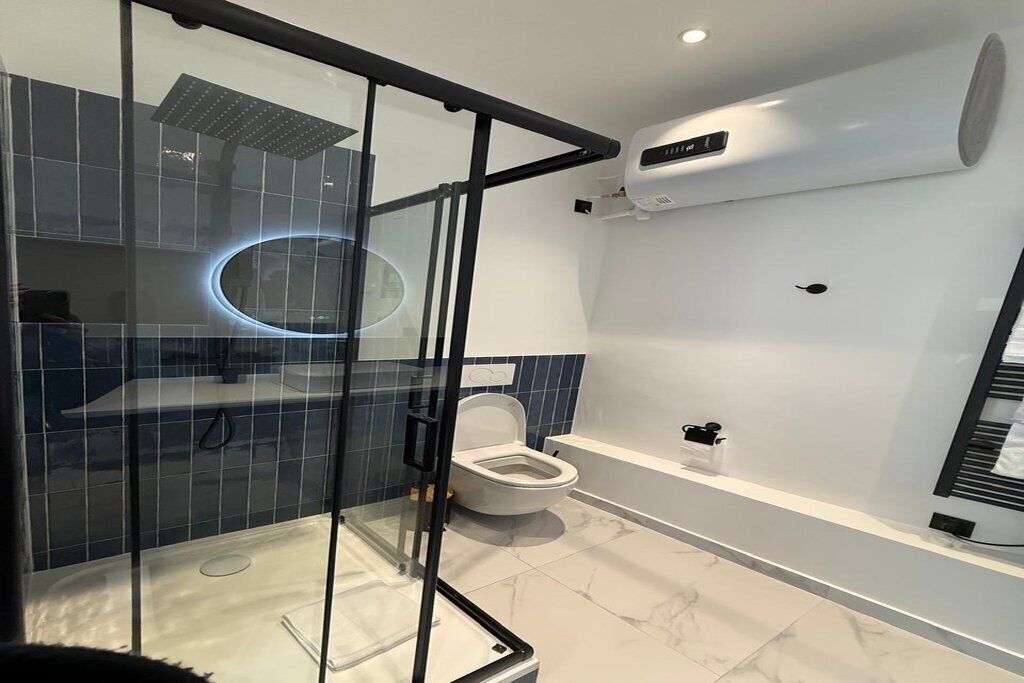 Shower, towels, soap, toilet paper
