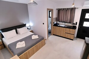 1 غرفة نوم وواي فاي وملاءات أسرّة