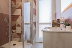 Apartment, 1 Bedroom | Bathroom | Soap, shampoo, toilet paper