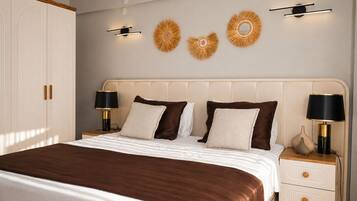 A bedroom with a bed, two bedside tables, a wardrobe, and wall decor.