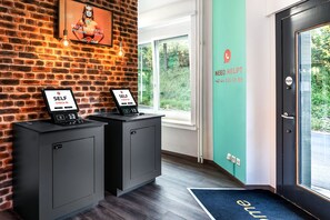 Check-in/check-out kiosk