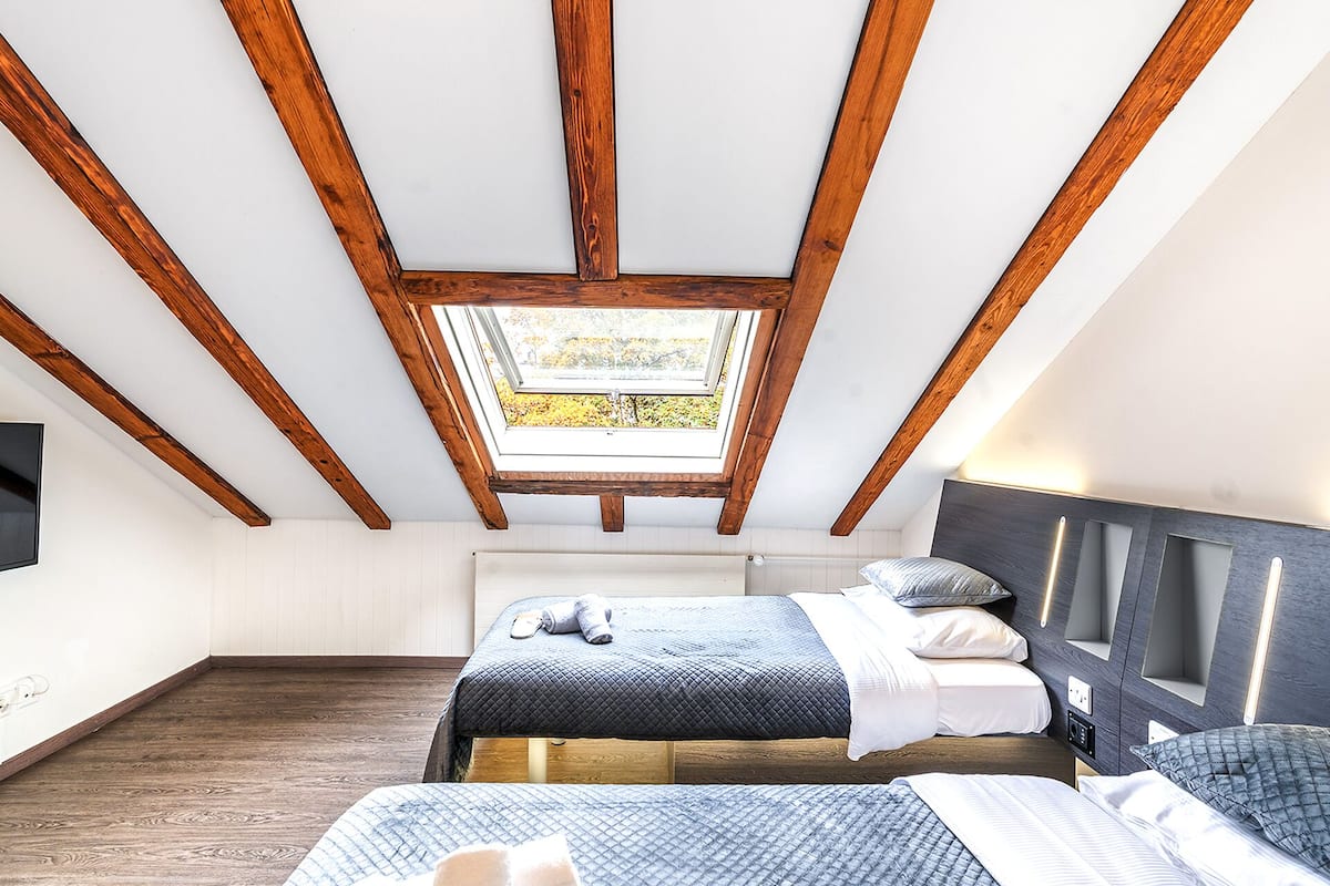 Habitación cuádruple familiar, varias camas, vistas a la ciudad | Wifi gratis