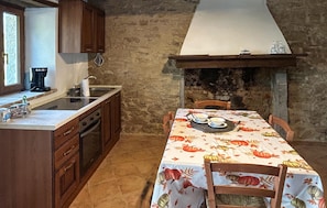 Fridge, coffee/tea maker, cookware/dishes/utensils