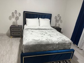 Iron/ironing board, travel crib, WiFi, bed sheets