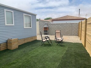 Maison, patio, vue jardin | Vue de la chambre