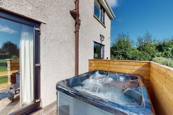 Bañera de hidromasaje exterior