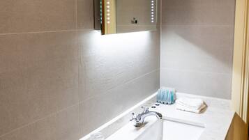 Hair dryer, towels, soap, toilet paper