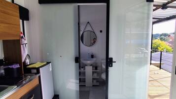 Superior Studio | Bathroom | Shower, hair dryer, towels, soap