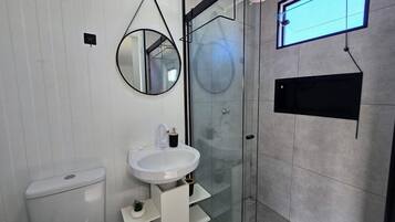 Superior Studio | Bathroom | Shower, hair dryer, towels, soap