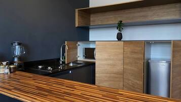 Fridge, microwave, stovetop, coffee/tea maker