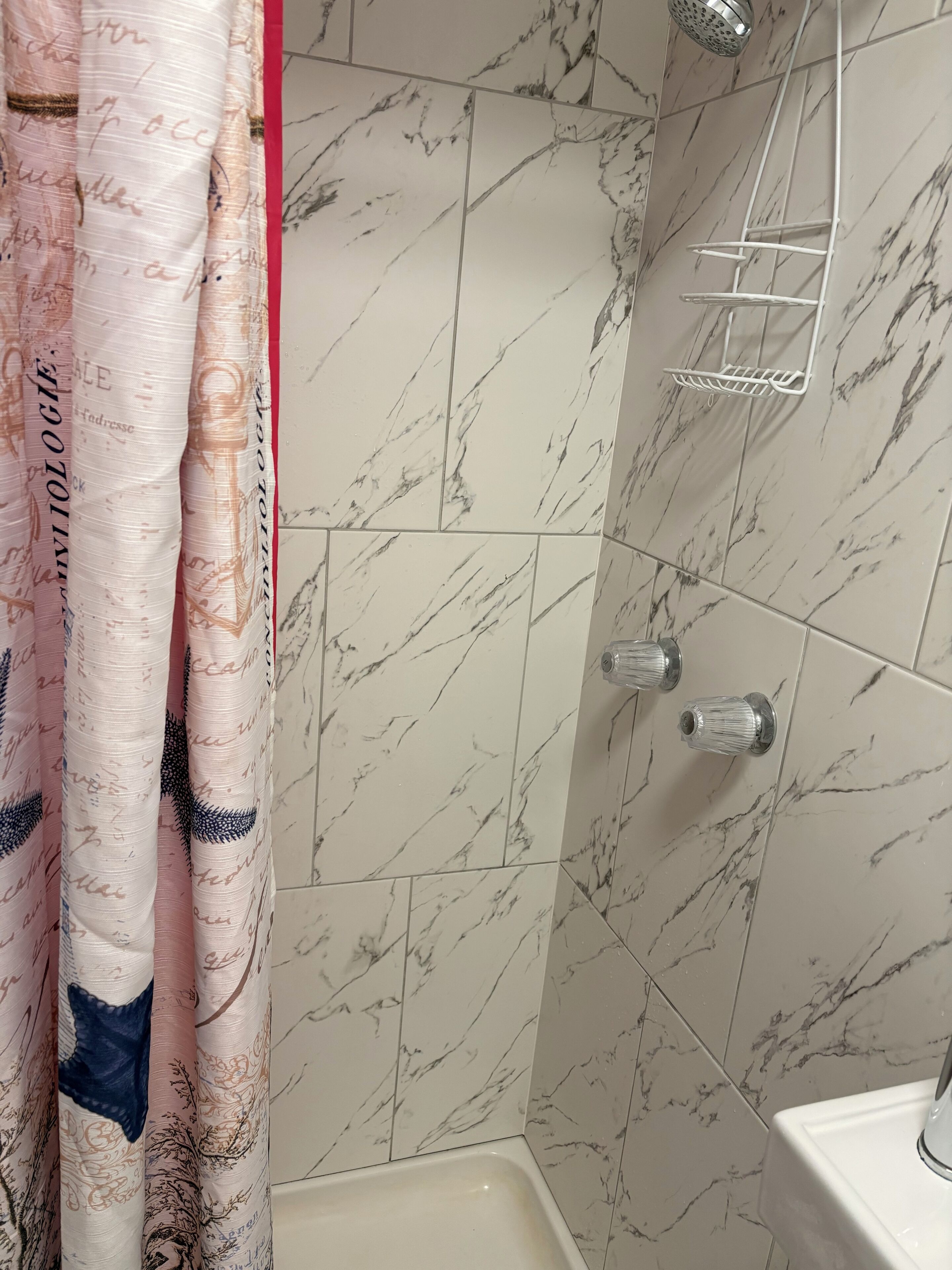Shower, towels, soap, toilet paper