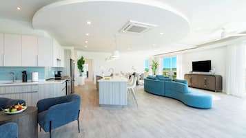 Luxe Honeymoon Suite with Terrace | Living area | 42-inch Smart TV with digital channels