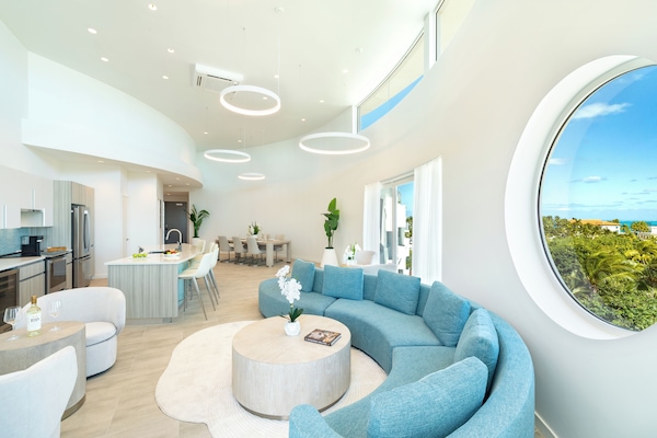 Ellipse Penthouse Suite | Living area | 42-inch Smart TV with digital channels