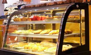 A bakery display case with various baked goods. - Jadelica Hotel Bungoma (Bungoma)