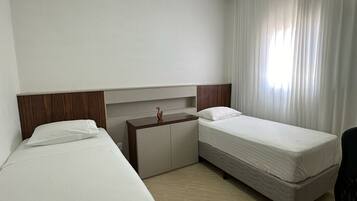 Apartment, City View | Desk, laptop workspace, blackout drapes, iron/ironing board
