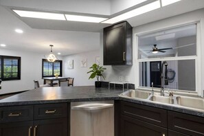 Fridge, microwave, oven, stovetop - Spacious Golf Course Home with Pool Sleep 12 (Rotonda West)