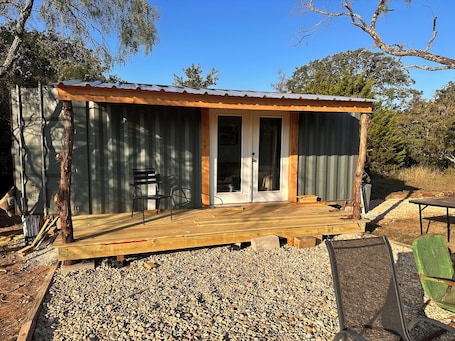 Exterior. Tiny Tiger Shipping container with AC in charming Whitney