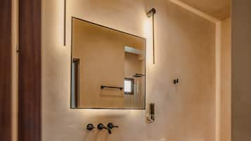 Shower, towels, soap, toilet paper