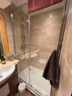 Shower, towels, soap, shampoo