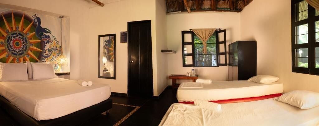 Superior-Vierbettzimmer, Terrasse, Gartenblick | Kostenloses WLAN, Bettwäsche