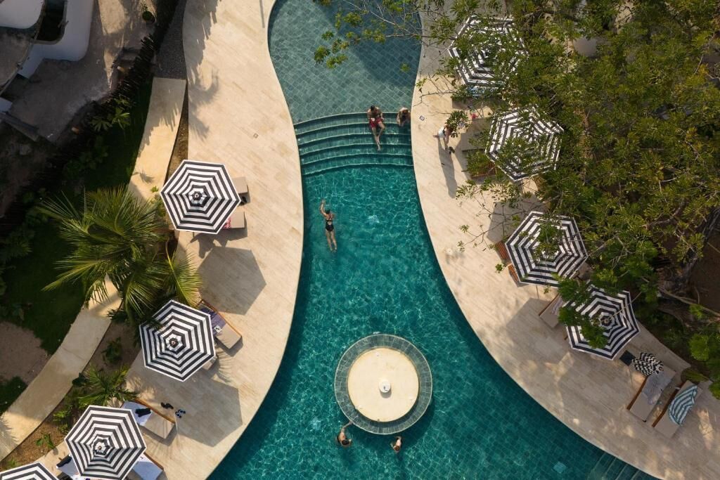 2 outdoor pools, open 7:00 AM to 9:00 PM, pool loungers