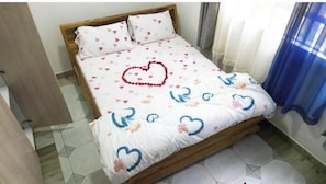 1 habitación y ropa de cama