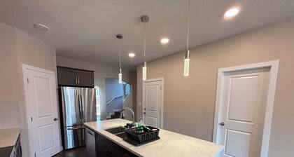 Three-bedroom House with Garage and Fenced Backyard