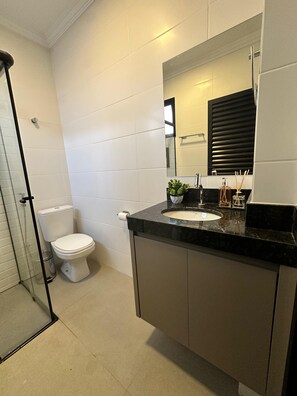 Hair dryer, towels, soap, toilet paper