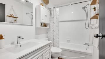 Hair dryer, towels, soap, toilet paper