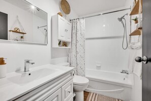 Hair dryer, towels, soap, toilet paper