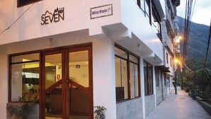 A hotel entrance with a sign reading "SEVEN" and "Wiiay Wayna". - Hotel Seven Mapi Machupicchu (Machu Picchu)