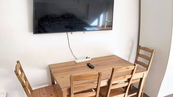 Superior Apartment, Garden View | Desk, laptop workspace, blackout curtains, soundproofing