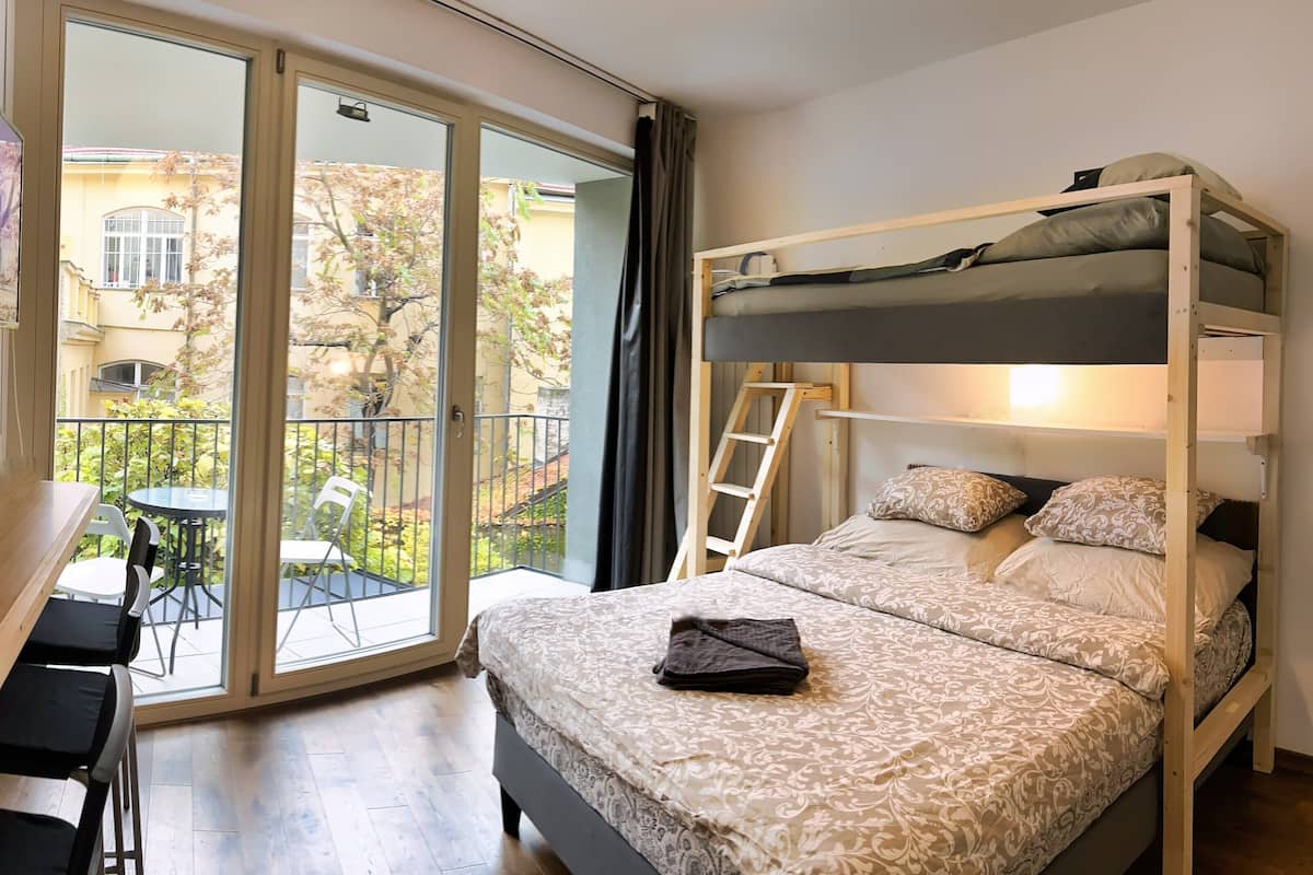 Apartment, Garden View | Desk, laptop workspace, blackout drapes, soundproofing