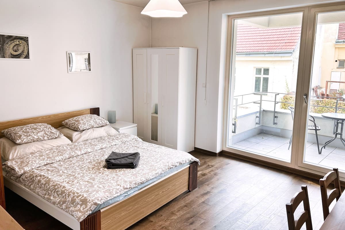 Superior Apartment, Smoking, Garden View | Desk, laptop workspace, blackout drapes, soundproofing