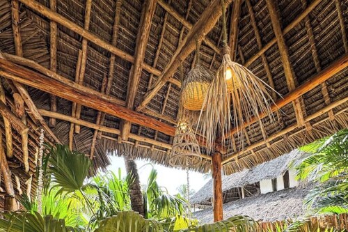 A private beach Villa with shared pool