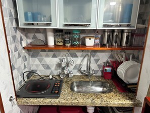 Microwave, stovetop - Complete, New and Air-conditioned Apartment in Lapa (Rio de Janeiro)