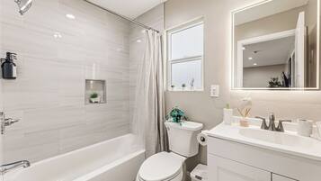 Hair dryer, towels, soap, shampoo