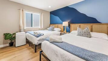 4 bedrooms, desk, iron/ironing board, travel crib