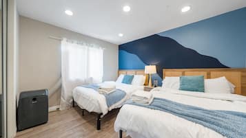 4 bedrooms, desk, iron/ironing board, travel crib