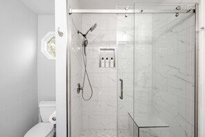 Shower, hair dryer, towels, soap