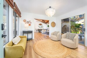 Smart TV, fireplace, books, computer monitors