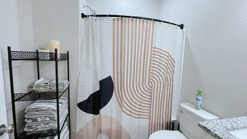 Hair dryer, towels, soap, toilet paper