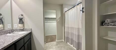 Shower, towels, soap, toilet paper