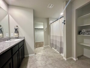 Shower, towels, soap, shampoo