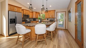 Fridge, microwave, oven, stovetop - 4-bedroom townhome in a quiet, upscale neighborhood with a private deck and yard (Bismarck)