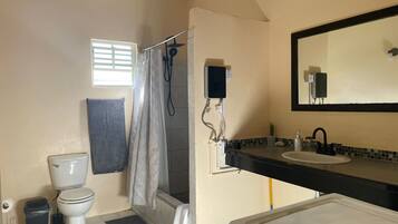 Shower, hair dryer, towels