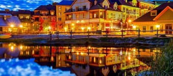 Family-friendly chalet with firelit lounge, golf views, hot tub & pool access